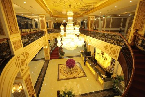 an overhead view of a hotel lobby with a chandelier at Lao Cai Royal Hotel in Lao Cai