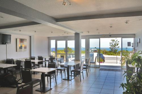 Restoran ili neka druga zalogajnica u objektu Logis Hotel Solhotel