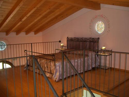 Postel nebo postele na pokoji v ubytování B&B Borgo Tre Case