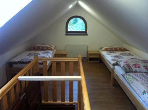 Postel nebo postele na pokoji v ubytování Penzion Terezka