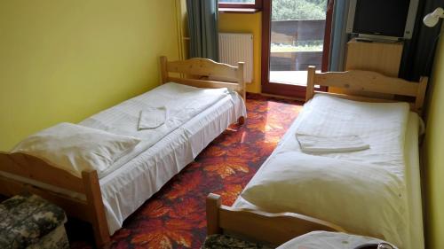 Tempat tidur dalam kamar di Piecuch