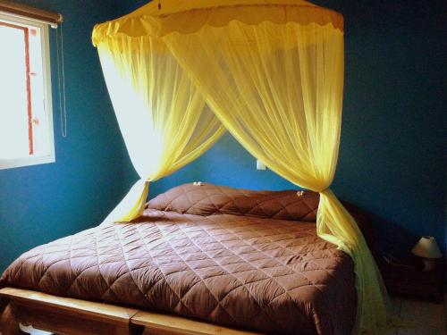 Letto o letti in una camera di Les Gites De Robinson