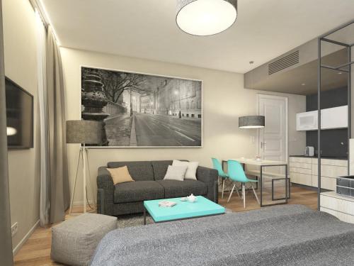 a living room with a couch and a table at Avenue Legerova 19 in Prague