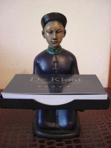 a statue of a woman holding a book at De Kloof Heritage Estate and Wellness in Swellendam