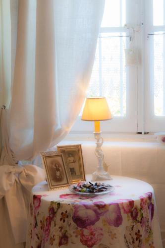Ένα ή περισσότερα κρεβάτια σε δωμάτιο στο Bed and Breakfast Papillon