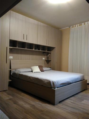 a bedroom with a large bed in a room at La Maiolica B&B in Balestrate