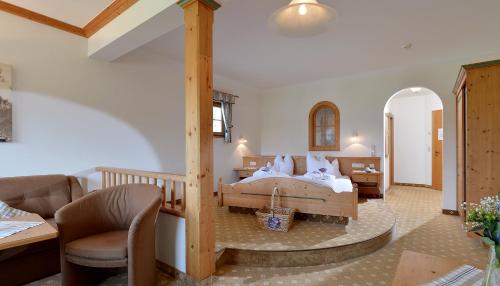 En eller flere senge i et værelse på Hotel Penzinghof