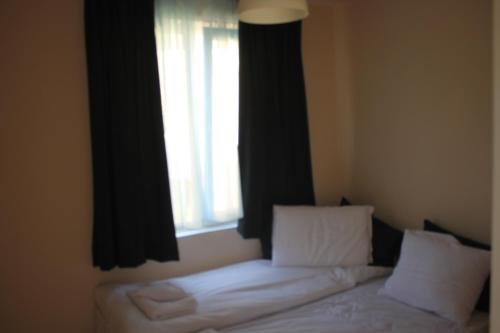 Daskalov Bungalowsにあるベッド