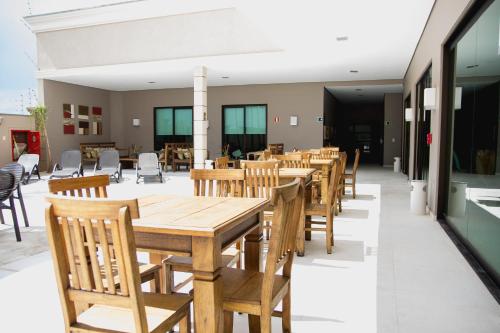 Class Hotel Pouso Alegreにあるレストランまたは飲食店