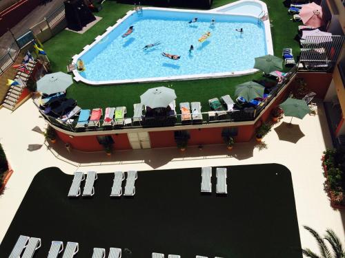 an aerial view of a pool at a resort at Apartamentos Amazonas in Playa del Ingles