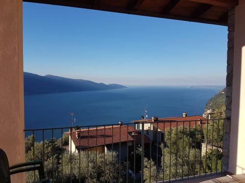 a view of the water from a balcony at Residence Erika in Tignale