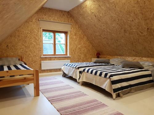 Postel nebo postele na pokoji v ubytování Jossi Holiday Home