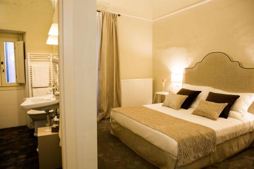 Tempat tidur dalam kamar di Palazzo Franceschini