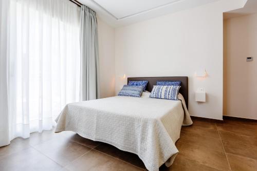 Кровать или кровати в номере Santa Maria Vecchia Relais