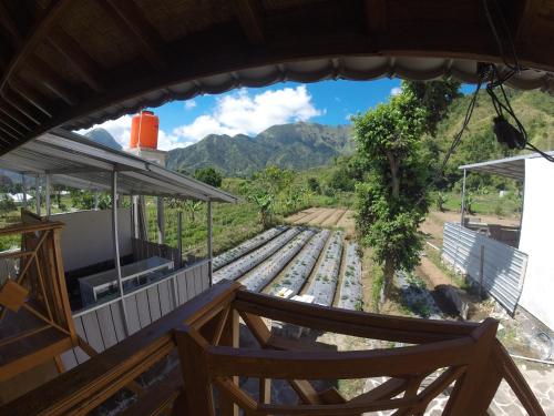 a view from the balcony of a train station at Bale Sembahulun Cottages & Tend in Sembalun Lawang