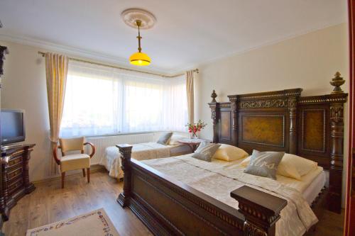 Posteľ alebo postele v izbe v ubytovaní Villa Tropikana