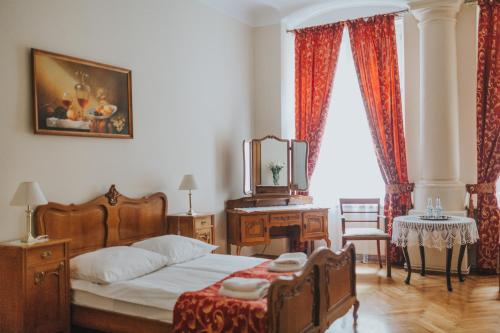 Ένα ή περισσότερα κρεβάτια σε δωμάτιο στο Aparthotel Camea