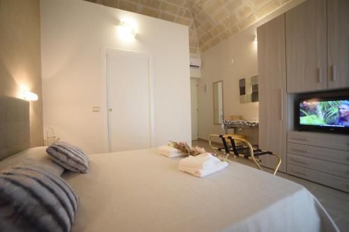 CASA FELICE Maison de Charmeにあるベッド