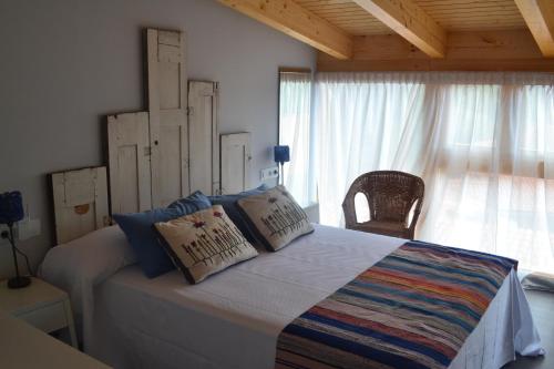 Postel nebo postele na pokoji v ubytování Pazo Larache