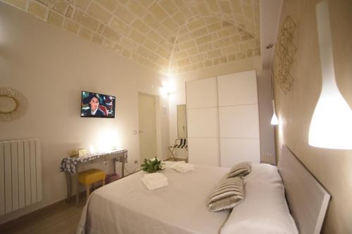 CASA FELICE Maison de Charmeにあるベッド
