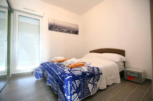Ένα ή περισσότερα κρεβάτια σε δωμάτιο στο Apartmani Ivan V RELAX