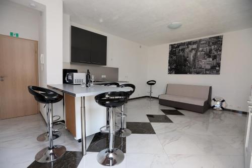 Μια τηλεόραση ή/και κέντρο ψυχαγωγίας στο Apartmani Ivan V RELAX