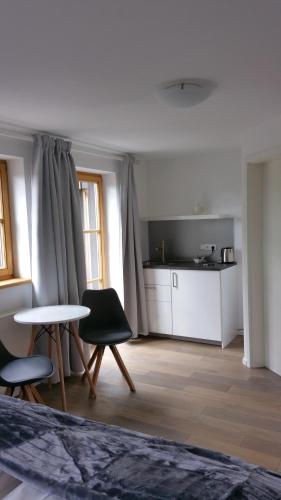 Kuchyň nebo kuchyňský kout v ubytování Schatzbergalm Pension