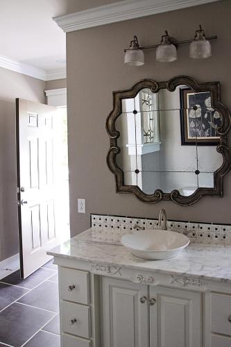 a bathroom with a sink and a mirror on the wall at Wishmaker House B&b in Bellville