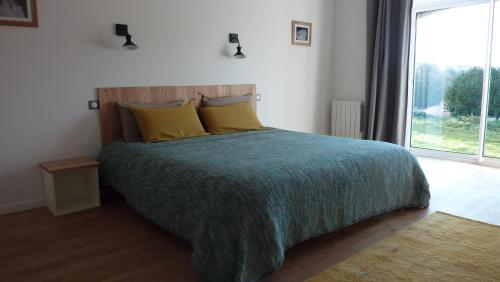 Postel nebo postele na pokoji v ubytování Chambre d'hôtes Chalendeix