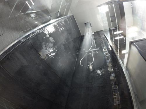 an overhead view of a bathroom with a toilet in a room at Catalans in Marseille