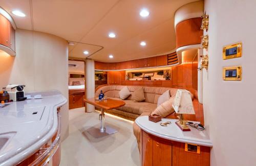 a living room and kitchen of a boat at Luxury Yacht Hotel in Gibraltar