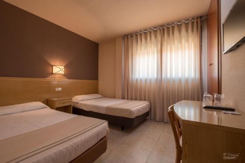 Hotel Vivarにあるベッド