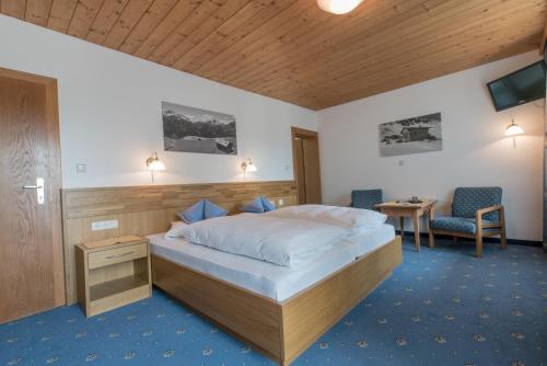 Postel nebo postele na pokoji v ubytování Pension Trojerhof