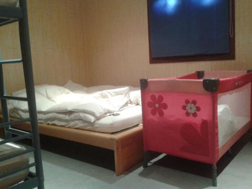 Cama ou camas em um quarto em chalet Imme