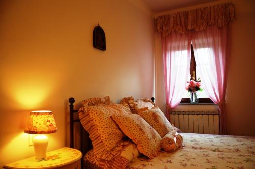 Postel nebo postele na pokoji v ubytování Tenuta Santa Chiara