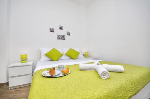 Posteľ alebo postele v izbe v ubytovaní Apartments Keli