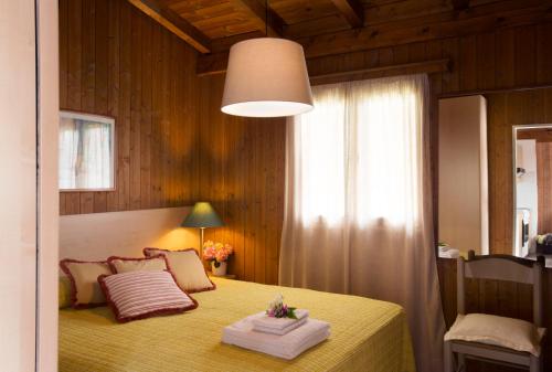 Krevet ili kreveti u jedinici u okviru objekta Campeggio Ideal Molino