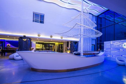 Gambar di galeri bagi Blue Boat Hotel JC di Utara Pattaya