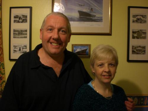 a man and a woman posing for a picture at Adam Place Guest House in Windermere