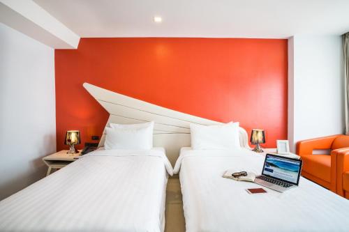 Katil atau katil-katil dalam bilik di Blue Boat Hotel JC