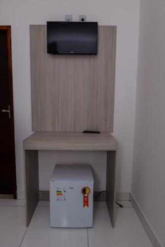 Televisyen dan/atau pusat hiburan di Pojuca Plaza Hotel