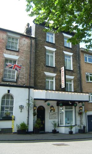 a building with a flag on top of it at St Martins Guest House in Dover
