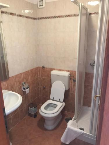 a bathroom with a toilet and a sink at Apartments Marija in Sveti Petar