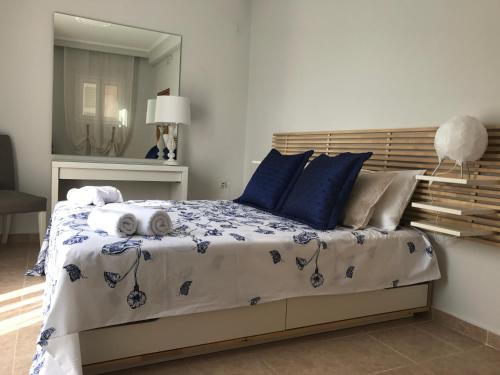 מיטה או מיטות בחדר ב-Casa Afrodite