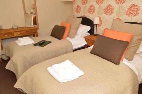 Katil atau katil-katil dalam bilik di Red Lion Inn