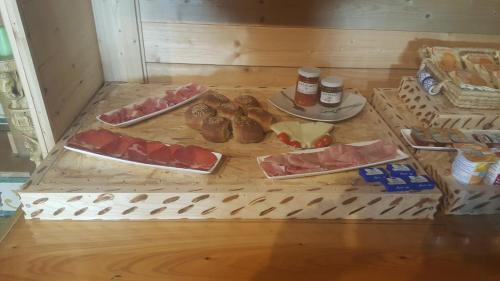 a table with different types of food on it at Agriturismo Duca di San Martino in Partanna
