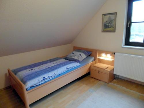 Postel nebo postele na pokoji v ubytování Haus Ferienromantik