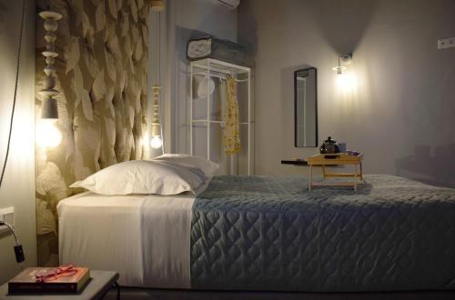 Ένα ή περισσότερα κρεβάτια σε δωμάτιο στο Evaris Apartments