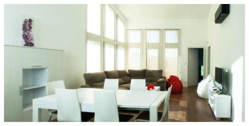a living room with a couch and a table at Eco House Tavilo in Outes