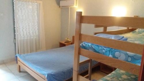 a bedroom with a bunk bed in a room at Apartments Villa Dadora in Sutomore